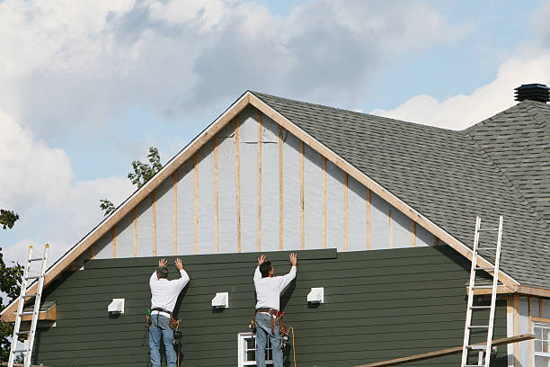 Professional Siding Replacement technician working in Sugar Land, TX